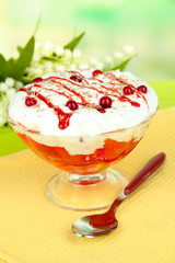 Tasty jelly in bowl on table on light background