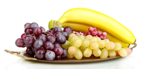 Golden tray with fruits isolated on white