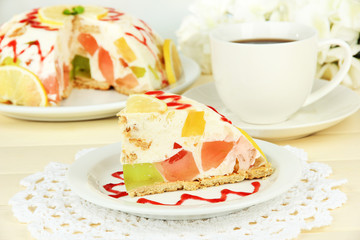 Delicious jelly cake on table close-up