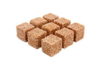Cubes of sugar with cinnamon isolated