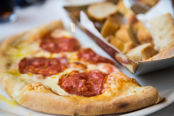 Fresh Pepperoni Pizza and Basket of Bread