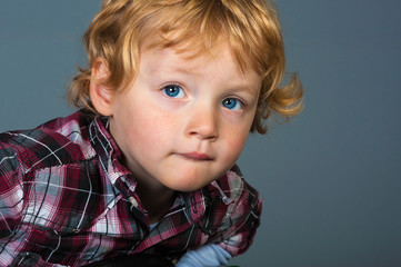 Portrait of cute blond toddler