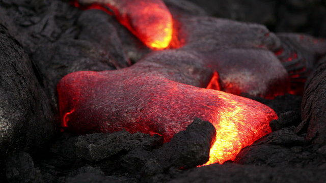 Molten lava flow close-up at Kilauea volcano, Hawaii