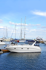 Obraz premium White motor yacht over harbor pier, Odessa, Ukraine