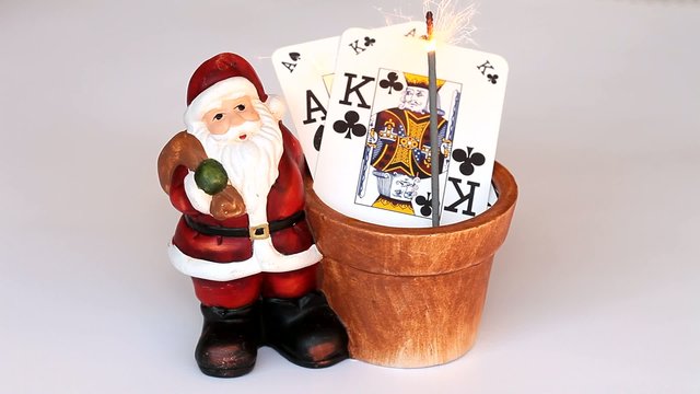 Santa claus with poker cards