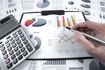 Obraz premium man hand and business report