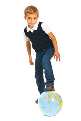 Kid playing with world globe