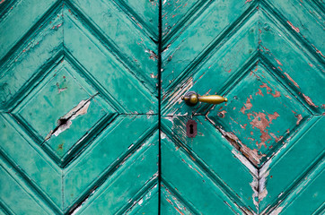 Fragment of old and dilapidated doors