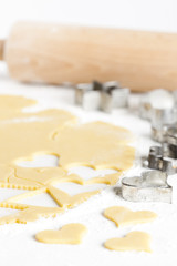 still life of dough with cookie cutters