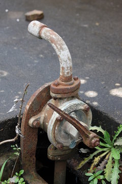 old rusty water pump