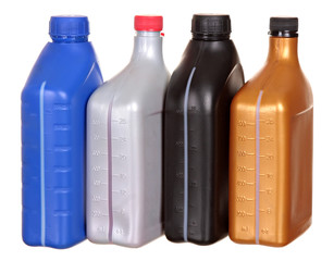 Plastic bottles from automobile oils isolated on a white