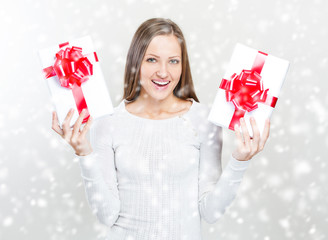 Young smiling woman hold christmas gift box