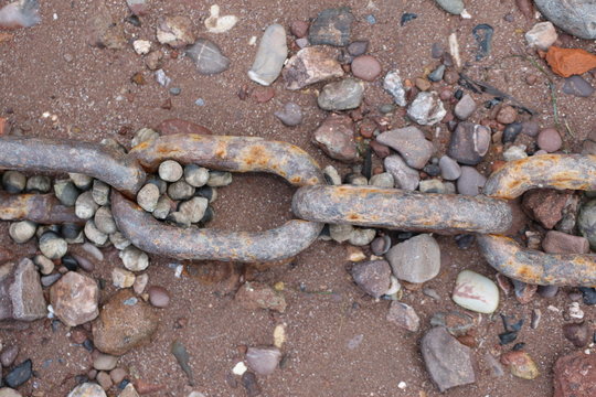 Rusty Chain on Pebble Beach