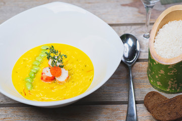 Risotto portion with shrimp and beans