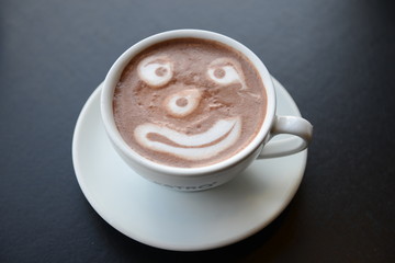 Cappucciono Art, Gesicht