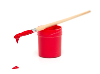 red gouache and brush