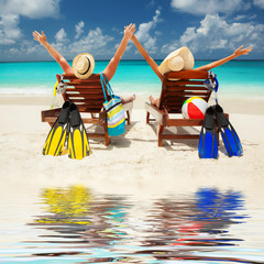 Happy couple on the beach of sea