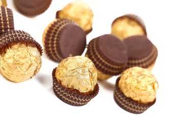 Bunch of chocolate gold bonbons.