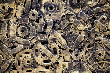 metallic car parts in garage