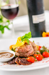 Beefsteak and vegetables.