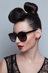 Fashionable model in trendy sunglasses.