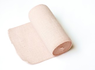 medical elastic bandage with reflection on white background