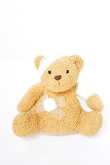 Patient bear with bandage after an accident, injury