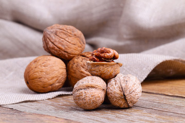 Walnuts on a wooden table.