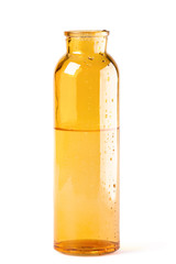 Yellow glass bottle with water