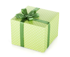 Green gift box with ribbon and bow
