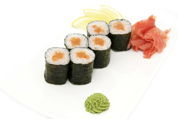Japanese rolls in a restaurant with fish and vegetables