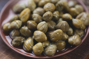 Close-up of marinated capers, horizontal shot
