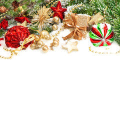 christmas decoration with red baubles und golden gift box