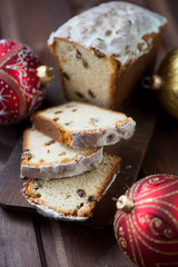 Vertical shot of sliced christmas cake, close-up