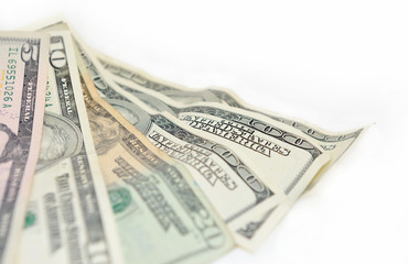A few notes of dollars on white background.