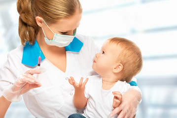 doctor does injection child vaccination baby