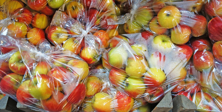 plastic bag with apples
