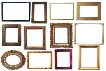 Collection of vintage wooden and golden empty frames isolated on