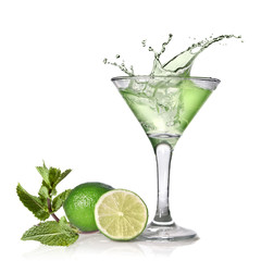 Green alcohol cocktail with splash, lime and mint isolated on wh