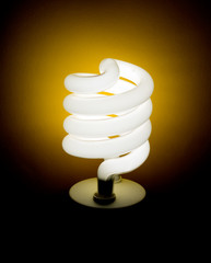 Eco-friendly green light bulb, lamp - on black