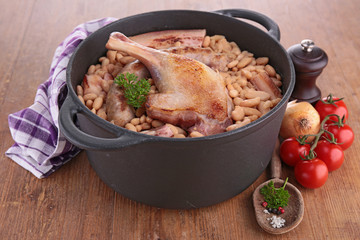 casserole with white bean and meats
