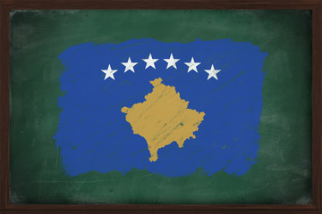 Kosovo flag painted with chalk on blackboard