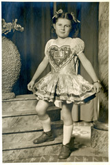 Girl in national costume with a big heart - circa 1955