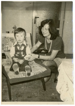 Young mother with her child - circa 1975