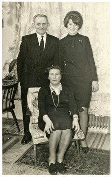 Father, mother and adult daughter, family - circa 1960