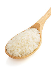 rice in spoon on white background