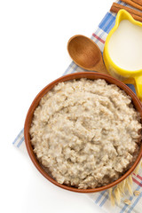 plate of oatmeal isolated on white