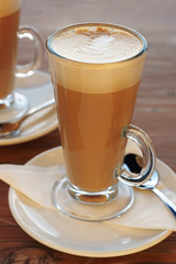 Latte Coffees in tall glasses with table settings