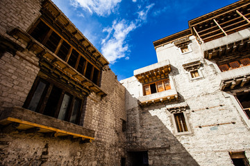 Fototapeta na wymiar Leh Monastery looming over medieval city of Leh