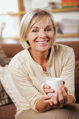 Portrait of senior woman having a cup of coffee